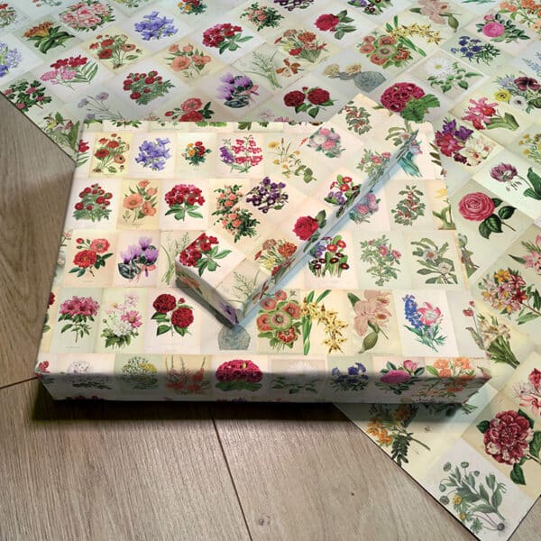 Different size boxes wrapped with Vintage Botanicals gift wrap sheet